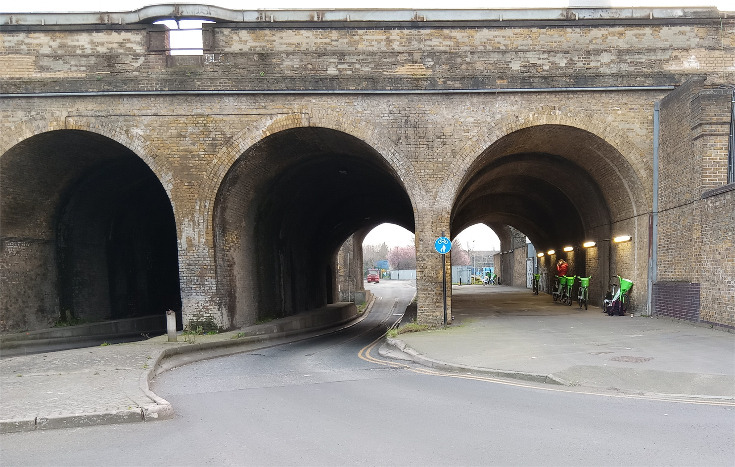 Three arches unde a railway bridge.